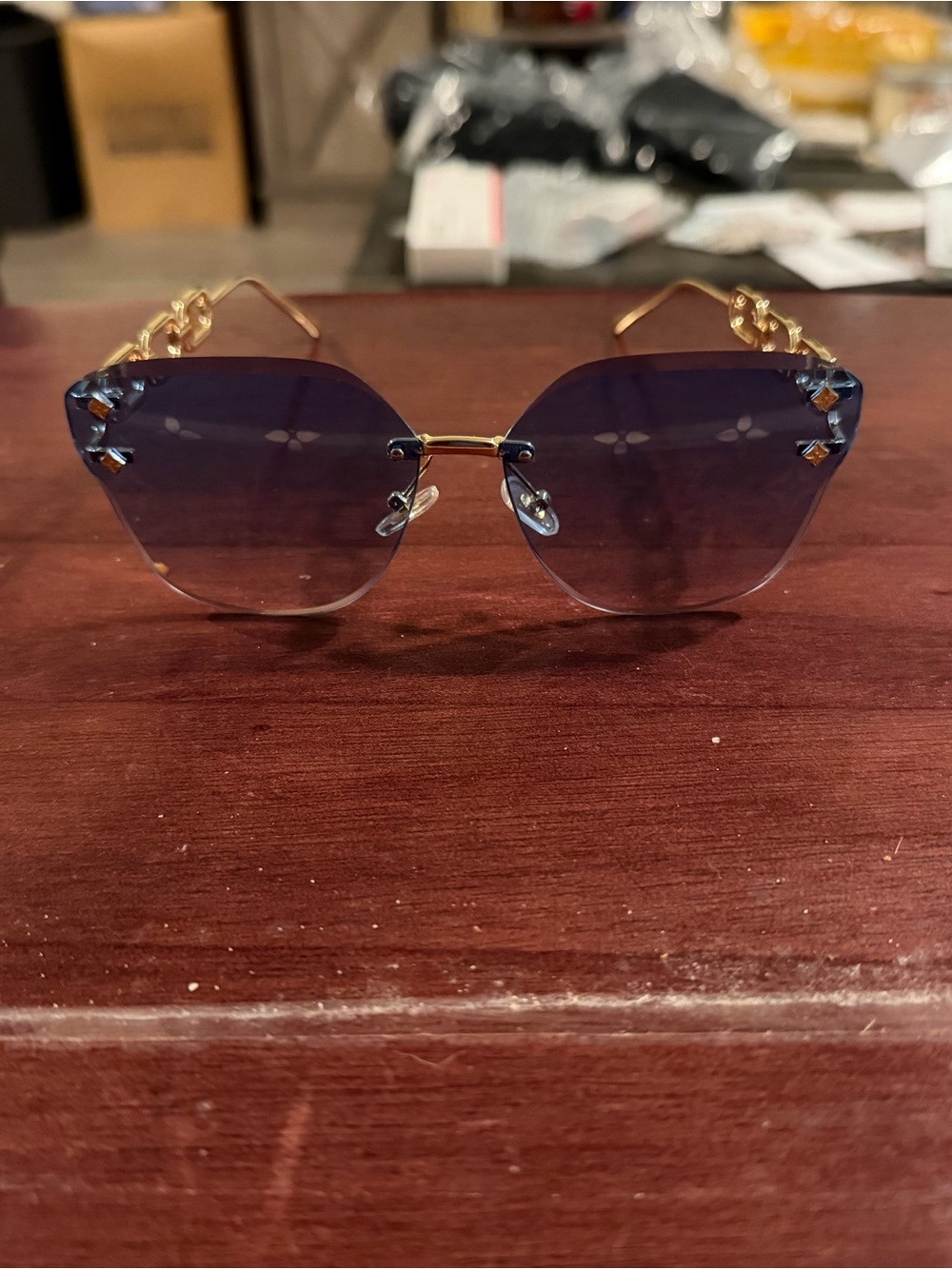 Louis Vuitton Rimless Blue Gradient Sunglasses with Gold Chain Temples